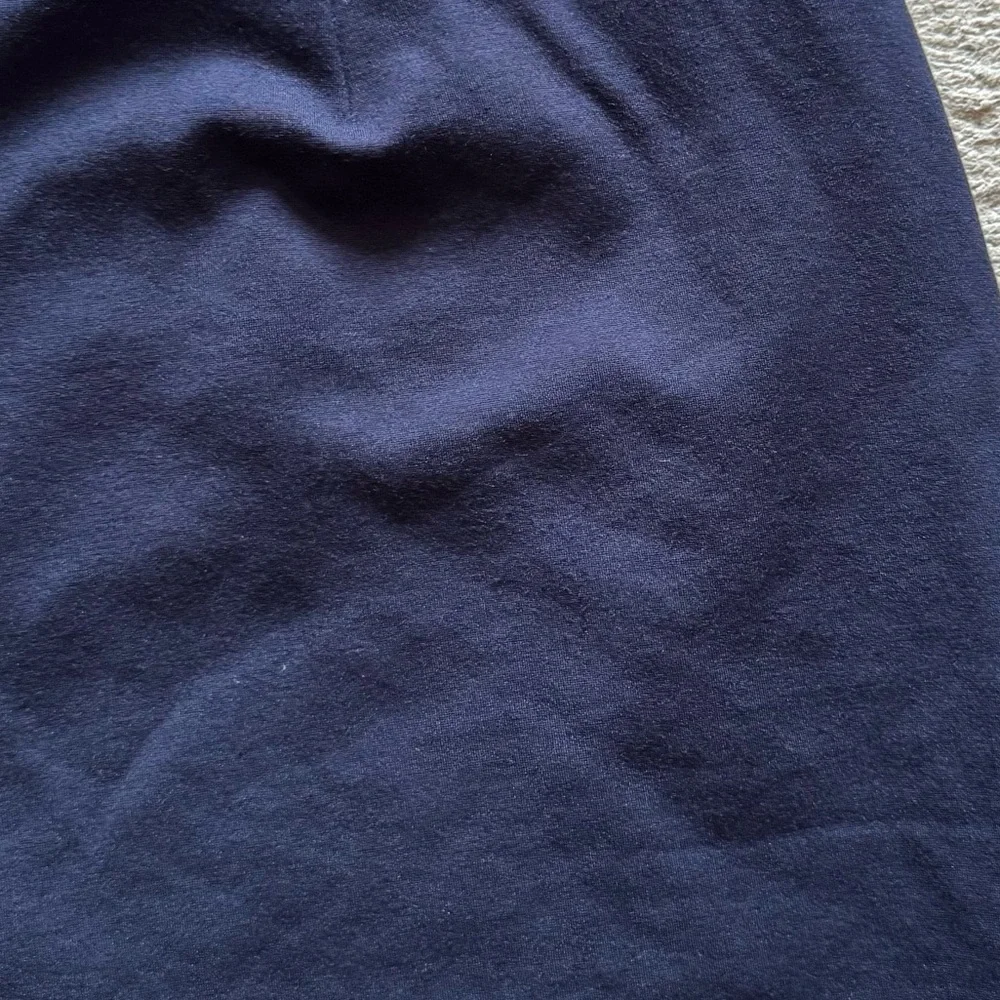 Ann Taylor Loft rich navy faux wrap asymmetrical skirt with faux pocket accent